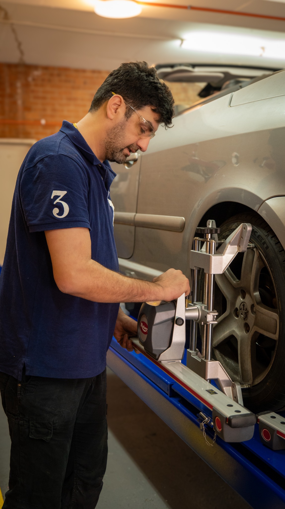 Hornsby Car Care mechanic working on wheel alignment